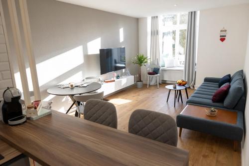 Μια τηλεόραση ή/και κέντρο ψυχαγωγίας στο FID B' Home, appartement Cosy entre Mulhouse et Colmar