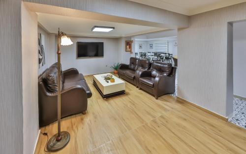 TV a/nebo společenská místnost v ubytování Palmada Hotel