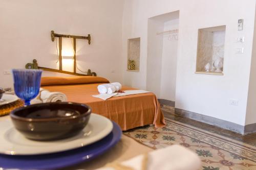 Letto o letti in una camera di Il Cortile dei Nonni