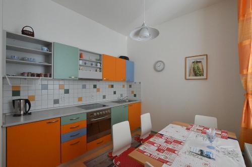 Kuchyň nebo kuchyňský kout v ubytování Apartmán Promenáda