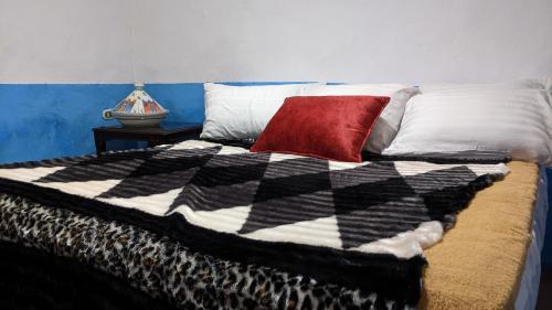 Postel nebo postele na pokoji v ubytování Bait Ward Nubian house