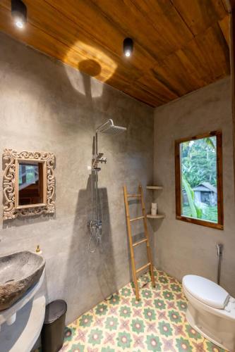 Ванная комната в Rumah Guci