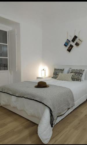 Ένα ή περισσότερα κρεβάτια σε δωμάτιο στο Casa do Raimundo