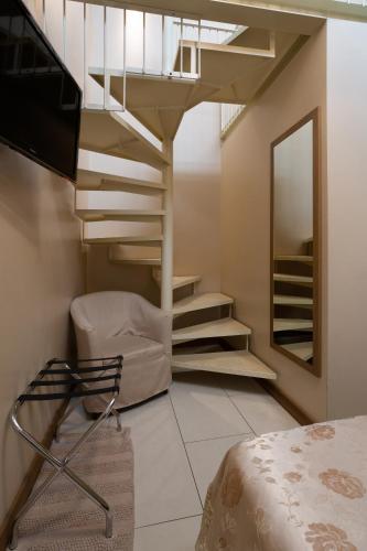 Posezení v ubytování La Castellana Loft Hotel