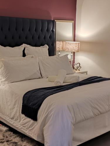 Katil atau katil-katil dalam bilik di Mayaza Luxury Apartment