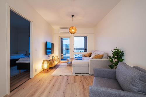 Posezení v ubytování Spacious 2BDR Apartment with Private Sauna