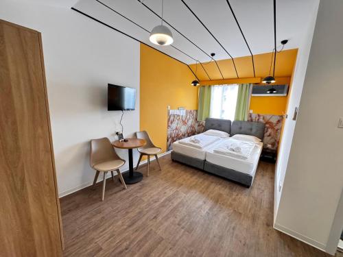 Postel nebo postele na pokoji v ubytování Modern Studio 11 private Kitchenette and Bathroom