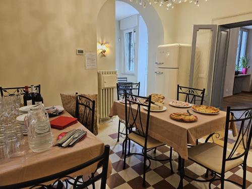 Kuchyň nebo kuchyňský kout v ubytování La Castellana Loft Hotel
