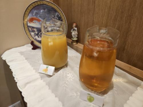 Nápoje v ubytování La Castellana Loft Hotel