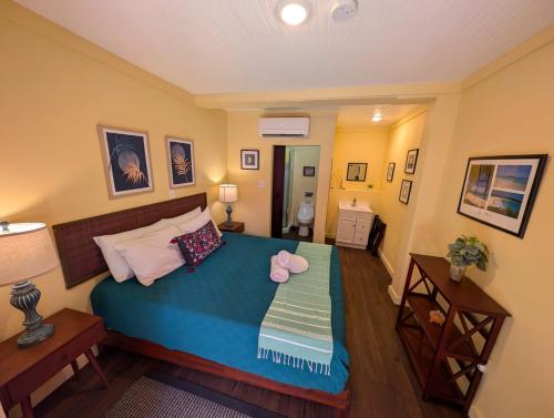 A bed or beds in a room at Waterside Inn