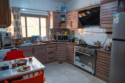 Kuchyň nebo kuchyňský kout v ubytování Extra Traveller