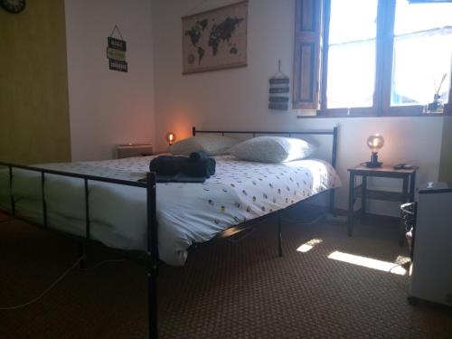 Una cama o camas en una habitación de Rooftop Face à la Cité 'RFC'