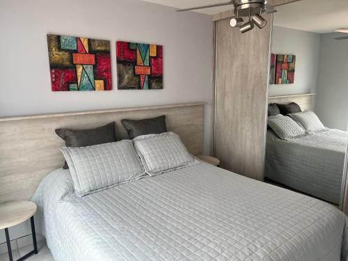 Ένα ή περισσότερα κρεβάτια σε δωμάτιο στο Casa Céntrica