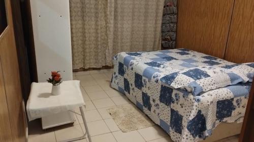Ένα ή περισσότερα κρεβάτια σε δωμάτιο στο Apartamento in Copacabana