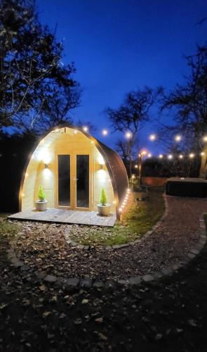 a small dome house at night with lights at Duke End Retreat in Coleshill