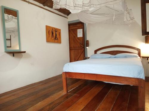 Postel nebo postele na pokoji v ubytování Bed and Breakfast Puerto López