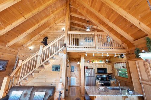 a view of a log cabin with a staircase at Eagles Point Cabin in Park Settlement