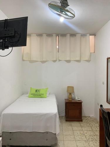 Кровать или кровати в номере Hotel Country Boutique