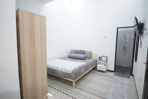 Postel nebo postele na pokoji v ubytování Casa de Vie Homestay