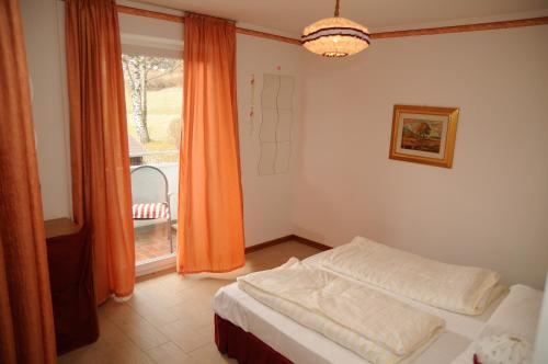 Postel nebo postele na pokoji v ubytování Roe Apartment