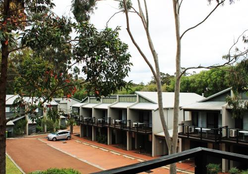 a row of houses with a car parked in front at Margarets Forest in Margaret River Town