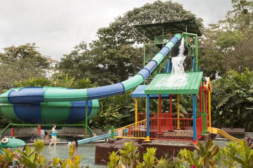 a splash park with a dog on a water slide at Baldi Hot Springs Hotel & Spa in Fortuna