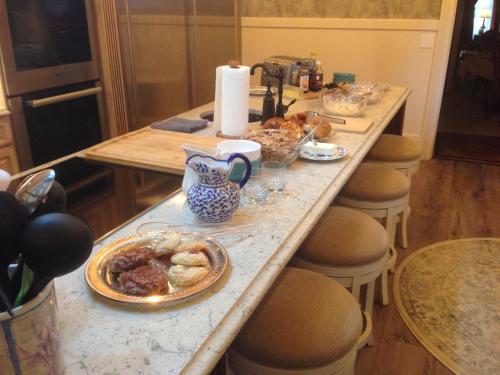 a table with a breakfast of food on it at Joslyn House in Bingen