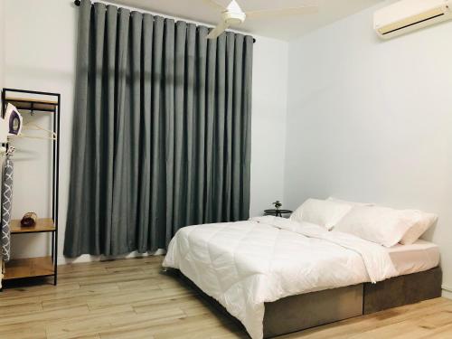 Ένα ή περισσότερα κρεβάτια σε δωμάτιο στο Haiso Homestay