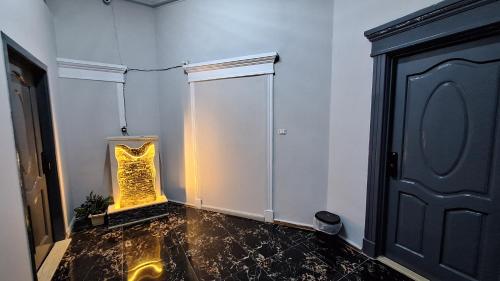 a room with a door with a sign on the wall at downtown Family Suites in Cairo