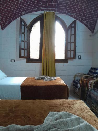 Cama o camas de una habitación en Kashta Nubian Guest Houst