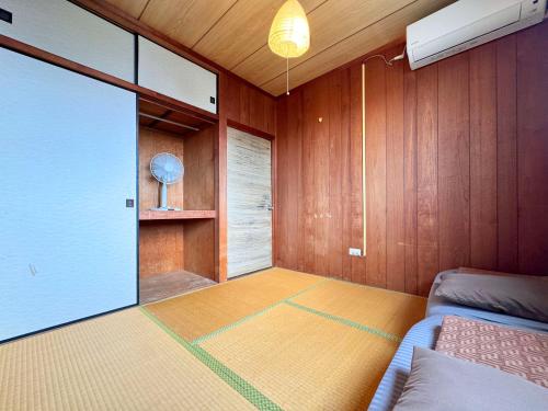 Ένα ή περισσότερα κρεβάτια σε δωμάτιο στο Guesthouse Asibina