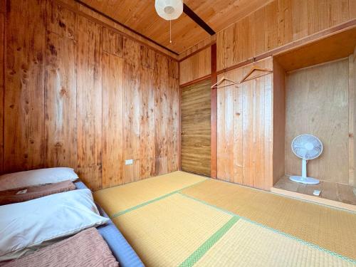 Ένα ή περισσότερα κρεβάτια σε δωμάτιο στο Guesthouse Asibina