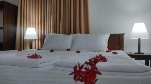 Ένα ή περισσότερα κρεβάτια σε δωμάτιο στο Royal Homestay cozy 2 bedroom house with all the facilities