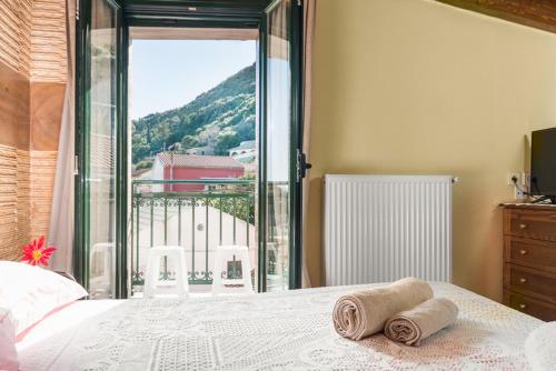 Postel nebo postele na pokoji v ubytování Traditional Venetian Stone House