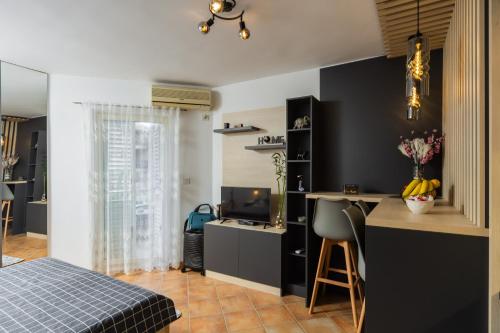 Ліжко або ліжка в номері Adzic Apartments