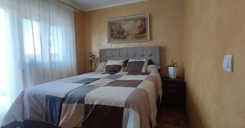 Postel nebo postele na pokoji v ubytování Boom House Fruska Gora