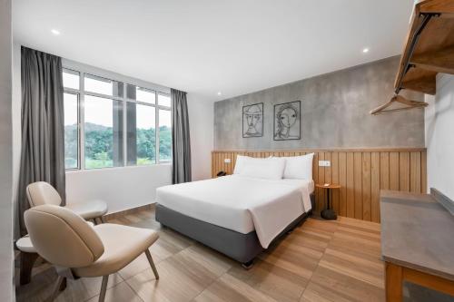 Postel nebo postele na pokoji v ubytování The Bayou Hotel Langkawi