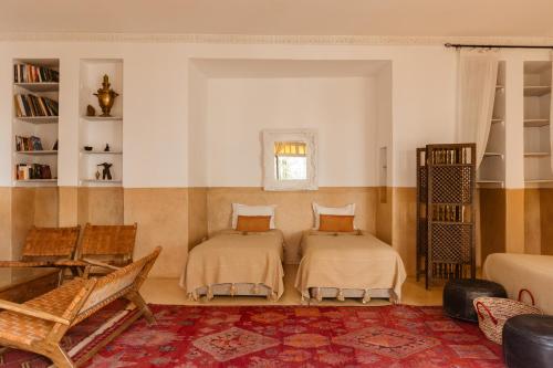 Cama o camas de una habitación en Dar Lalla F'dila