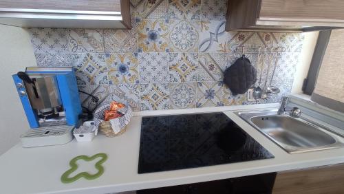 Kuchyň nebo kuchyňský kout v ubytování Casa Anna