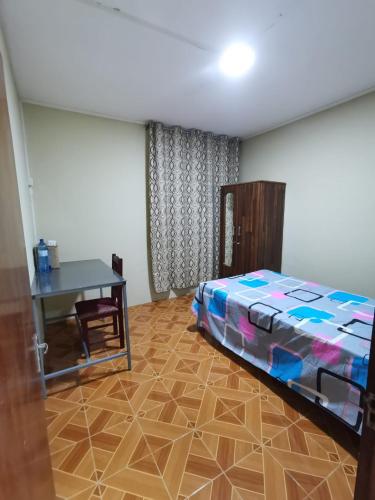 Ένα ή περισσότερα κρεβάτια σε δωμάτιο στο Quatre bornes Rooms COLIVING