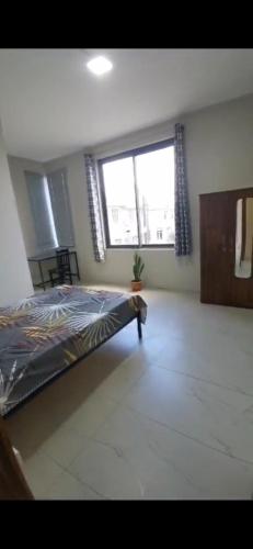 Ένα ή περισσότερα κρεβάτια σε δωμάτιο στο Quatre bornes Rooms COLIVING