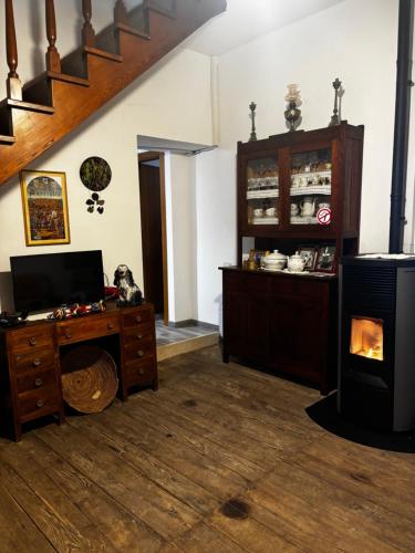 TV a/nebo společenská místnost v ubytování Casa Cortes