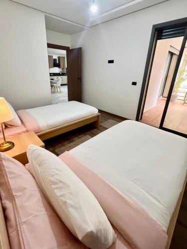 Ein Bett oder Betten in einem Zimmer der Unterkunft M océan