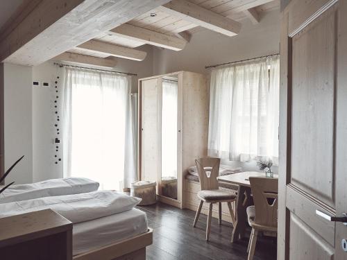 Postel nebo postele na pokoji v ubytování B&B Mia Majon