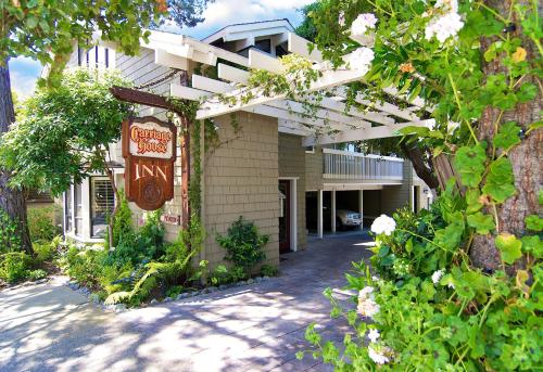 a building with a sign on the side of it at Carriage House Inn in Carmel