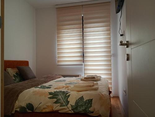 Apartman Todorovic Zlatiborにあるベッド