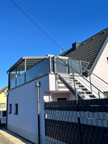 a building with a staircase on the side of it at Haus 30 Apartment in Zeltweg