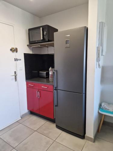 Photo de la galerie de l'établissement Séjour au Lagon Bleu - Piscine Tennis Aire enfants - Fréjus, à Fréjus