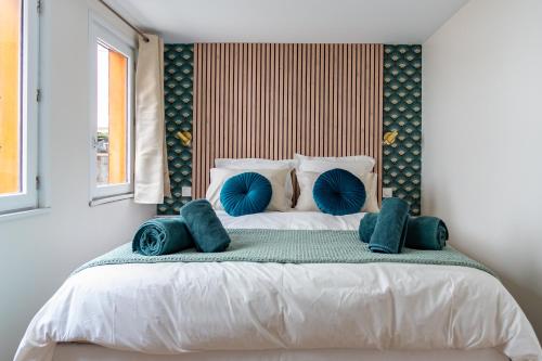 Ένα ή περισσότερα κρεβάτια σε δωμάτιο στο Logement moderne, luxueux, Hyper centre