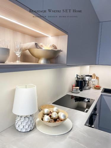 Η κουζίνα ή μικρή κουζίνα στο Apartament premium z widokiem na miasto